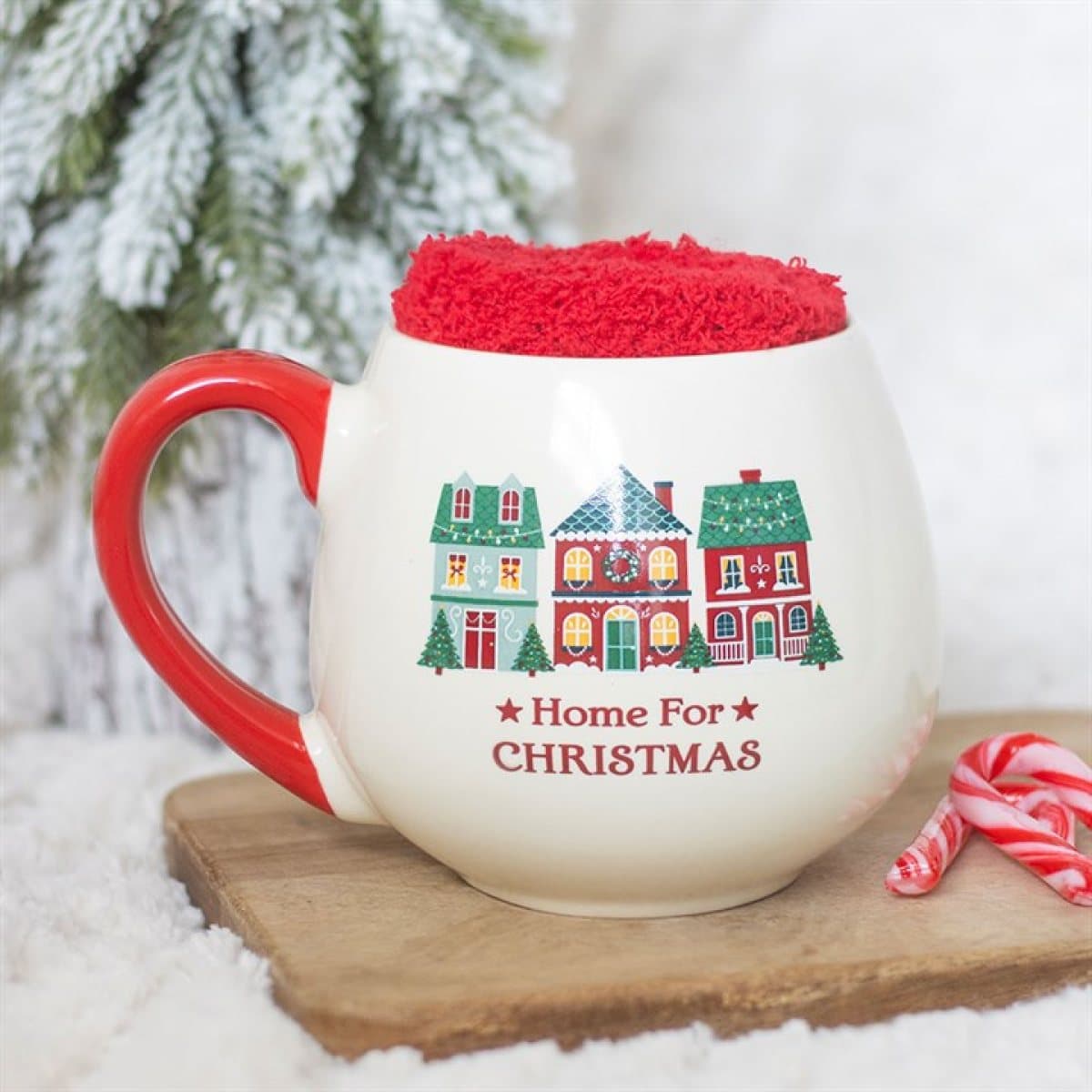Festive ceramic Home for Christmas mug with a pair of soft red socks in a box